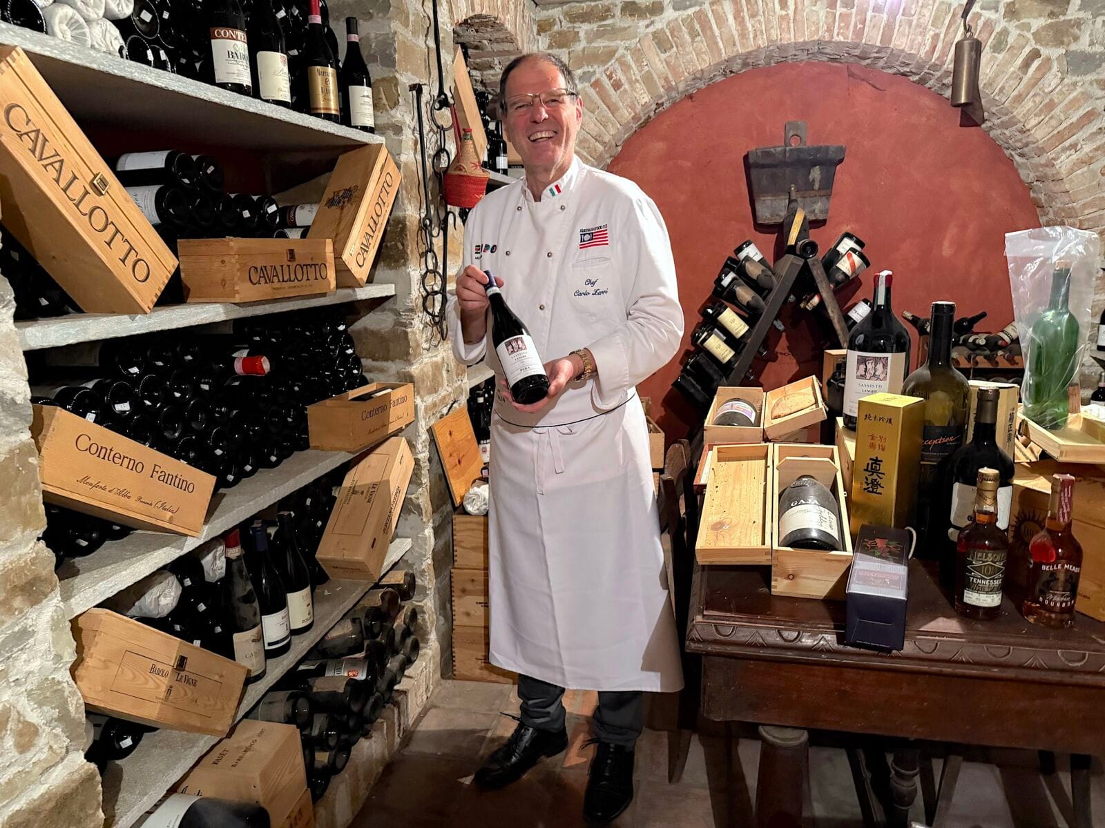 Chef Carlo Zarri in wine cellar